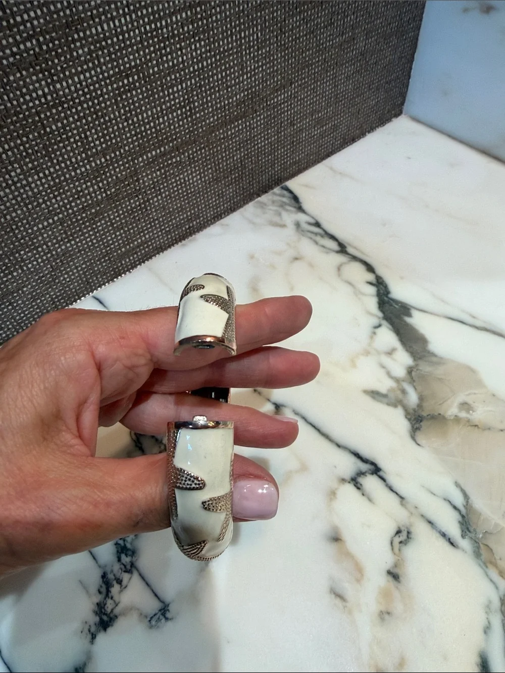 White enamel Bangle Bracelet with Textured gold tone Starfish Accents